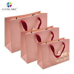 Customized Embossed Print Wholesale Promotional Shopping Tote Coated Art Clothing Kraft Paper Bags for Gifts Packaging