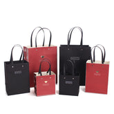 Customized Personalized Designer Promotional Garment Clothes Boutique Paper Packaging Shopping Gift Bags with logo Packaging