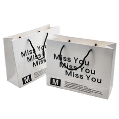 Custom Printed Logo Private Label Matte Lamination Reflex Cardboard Perfume Gift Wrapping Cosmetic Paper Bag for Promotion