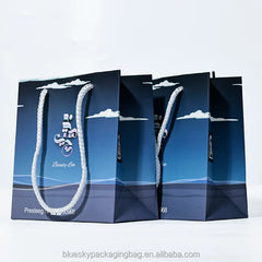 OEM/ODM Customized Logo Blue Paper Bag Paper Shopping Bag Paper Gift Bag Paper Packaging Bag for Retail Wedding Paper Bags