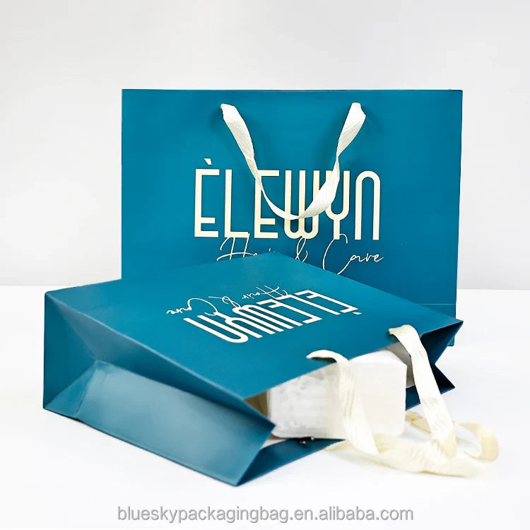 Christmas Blue Gift Paper Bag - Festive Design with Snowflake Pattern, Holiday Packaging for Presents (10x7x5cm)