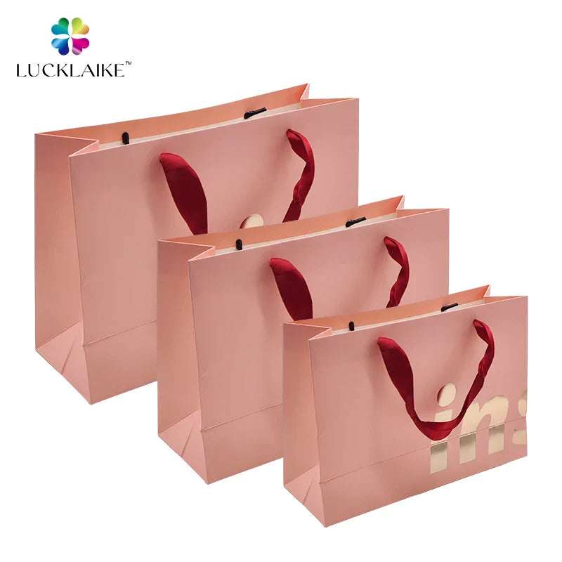 Customized Embossed Print Wholesale Promotional Shopping Tote Coated Art Clothing Kraft Paper Bags for Gifts Packaging