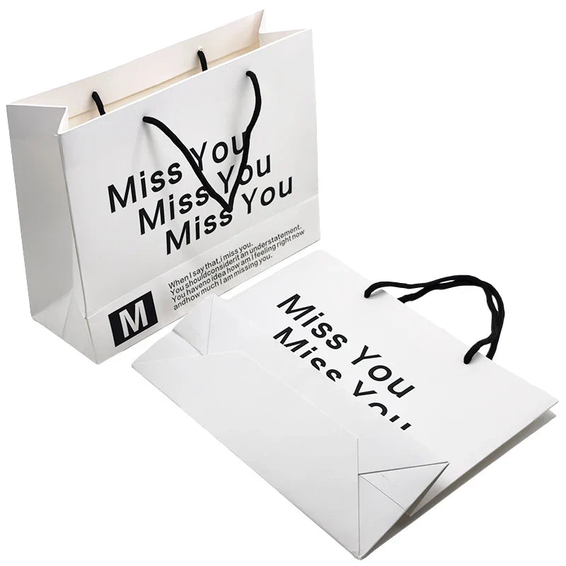 Customized Personalized Designer Promotional Garment Clothes Boutique Paper Packaging Shopping Gift Bags with logo Packaging