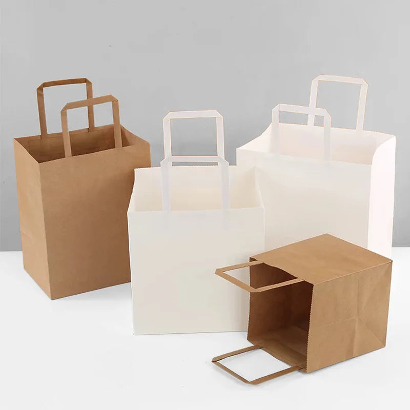 OEM/ODM Customized Hot Sale Multi-size & Color Kraft Paper Bags Luxury Clothing Gift Kraft Bag with Twisted Handle