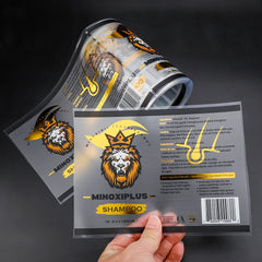 Customized Clear Backing Bopp Viny Gold Foil Logo Printing Shampoo Sticker Roll Label for Hair Oil Bottles With Custom Label