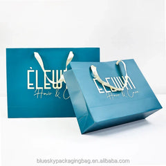 Christmas Blue Gift Paper Bag - Festive Design with Snowflake Pattern, Holiday Packaging for Presents (10x7x5cm)