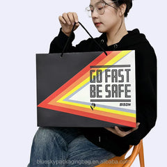 Minimalist Plain White/Black Paper Handheld Bags with Subtle Handles - Sleek Packaging for High-End Products & Corporate Use