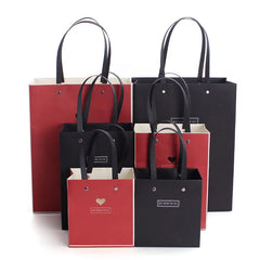 Customized Personalized Designer Promotional Garment Clothes Boutique Paper Packaging Shopping Gift Bags with logo Packaging