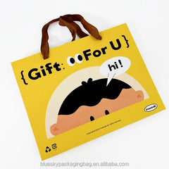 OEM/ODM Customized Cute Yellow Cartoon Paper Bag Gift Packaging Bag  Handle Paper Shopping Tote Bag for Birthday Party Paper Bag